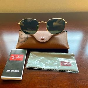 Woman’s Rayban Hexagonal Flat lenses, gold frames with a green/gray lense